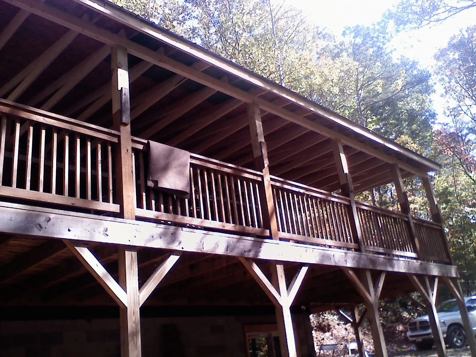 Timber framing under a new elevated porch and deck — Roof Leak Repair in Chelsea by Roofing Brothers